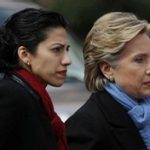 Democratic presidential candidate Senator Clinton (D-NY) walks with traveling chief-of-staff Abedin as they approach a group of police officers after cancelling a rally in Fort Worth
